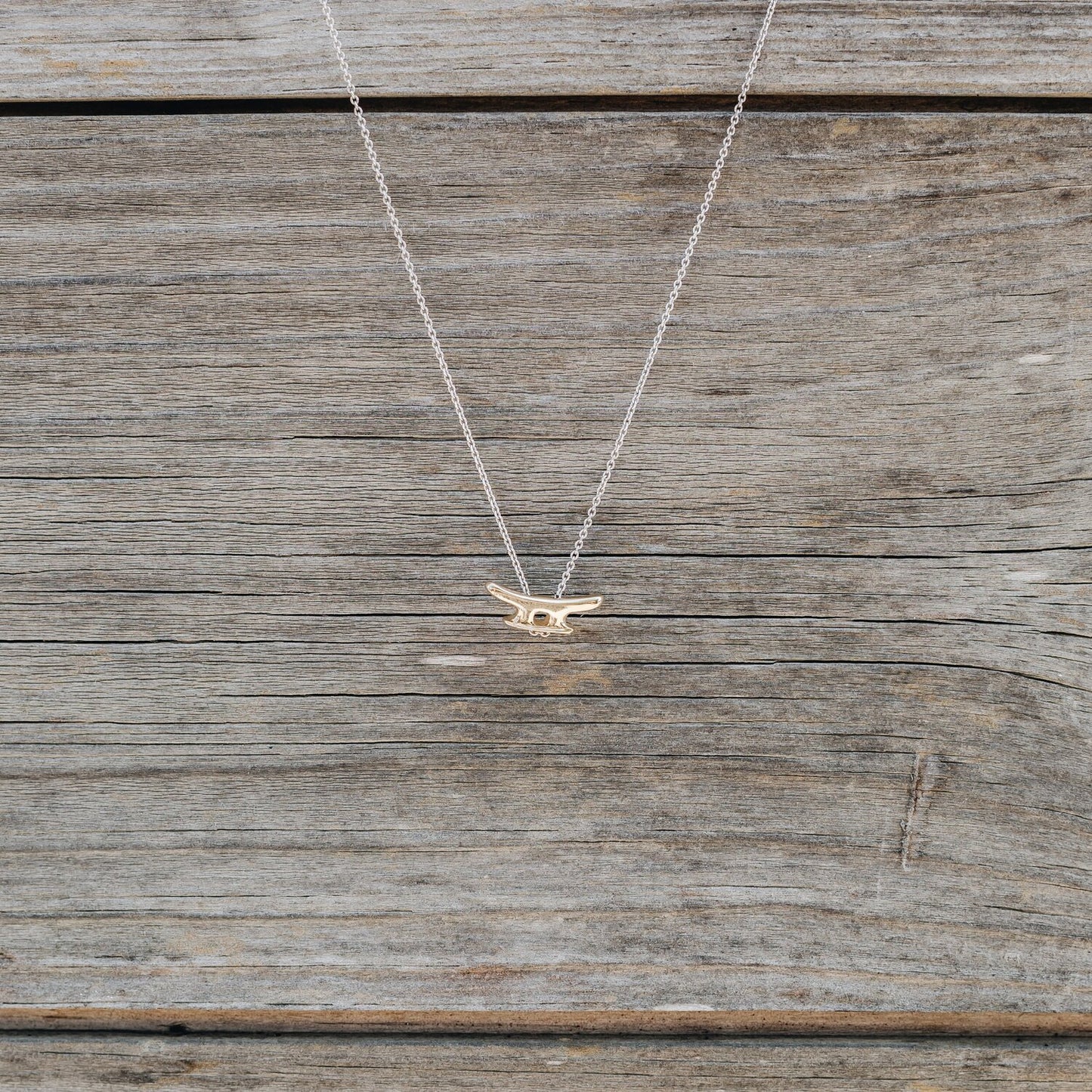Cleat Necklace in 14K Yellow Gold and Sterling Silver handmade by Jewel in the Sea Nantucket