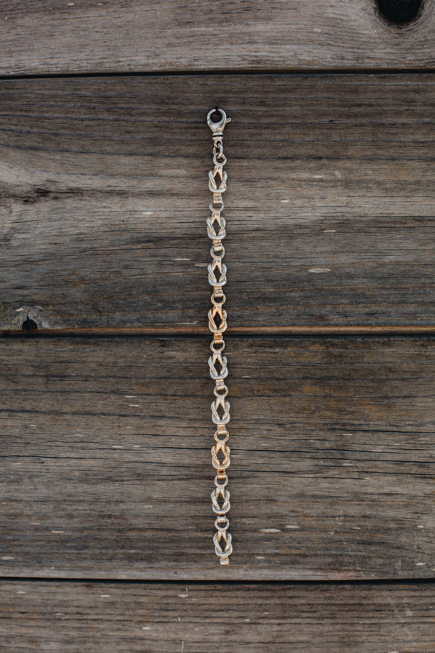 Sterling Silver and 14K Yellow Gold Square Knot Link Bracelet handmade by Jewel in the Sea