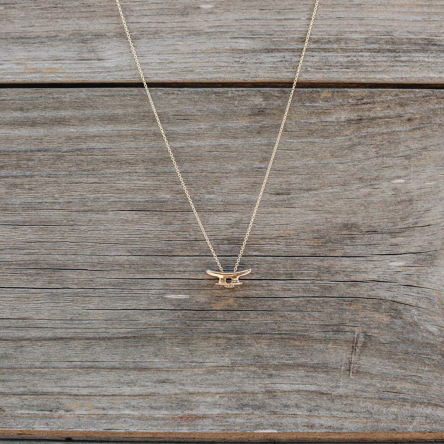 Cleat Necklace in 14K Yellow Gold handmade by Jewel in the Sea Nantucket